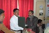 Abul Hassan Khan collecting his shield from DCAAF Karachi