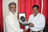 Mehrab Ali Channa collecting his shield from DCAAF Karachi